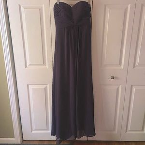 Strapless plum bridesmaid dress.